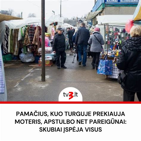 Moteris parduoda žuvį Kisumu turguje