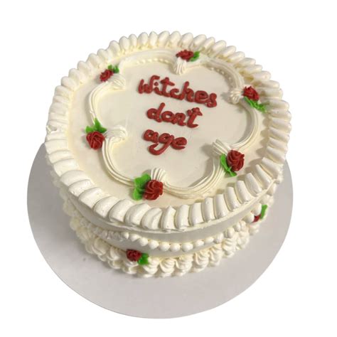 Tortas su užrašu ir dekoracijomis