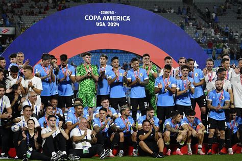 Urugvajaus futbolo rinktinės džiaugsmas laimėjus Copa América