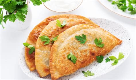 Čeburekų kepimas aliejuje