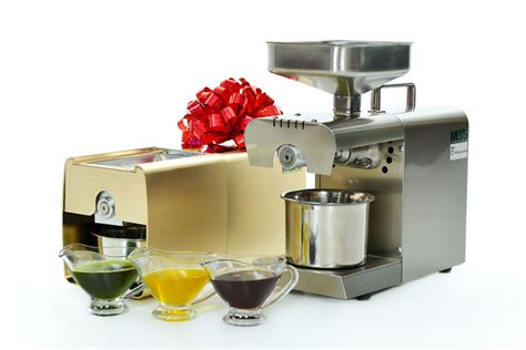 Nuotrauka su buitiniu šalto spaudimo aliejaus presu