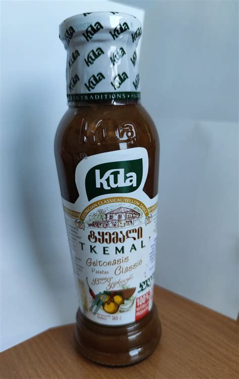 Paruoštas tkemali padažas stiklainėliuose