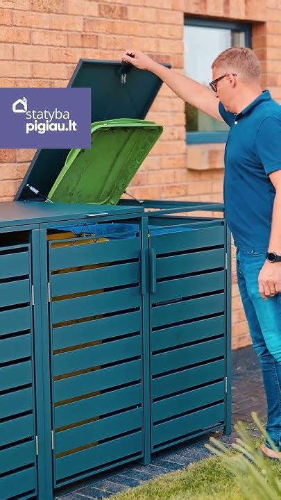 Šiukšlių konteinerių slėptuvė, paslėpta už modernios pastogės