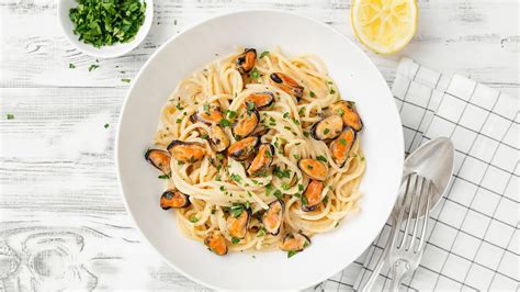 Spagečiai su jūros gėrybėmis paruošti patiekimui