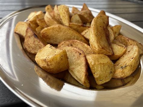 Prieskoninės bulvių skiltelės