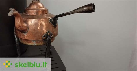 Antikvarinis virdulys su medaliais