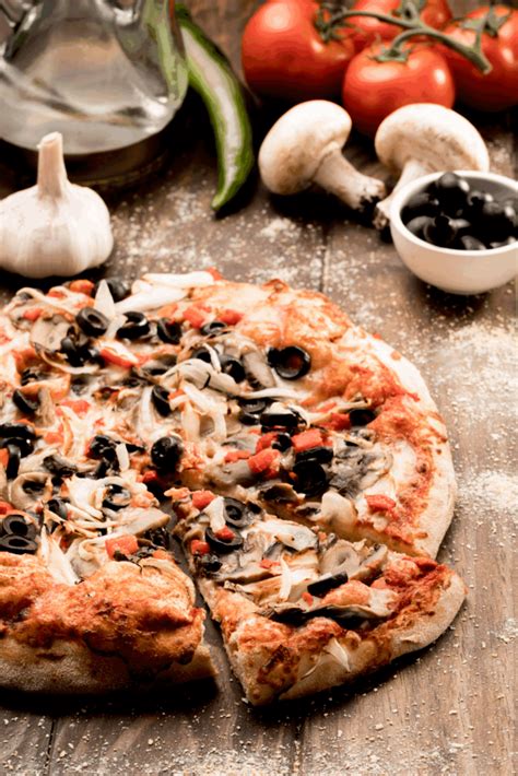 Įvairių picos ingredientų pasirinkimas
