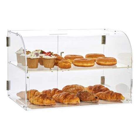 Konditerijos parduotuvės vitrina su tortais