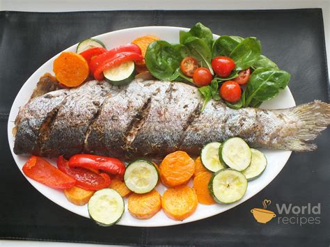 Grilintas upėtakis su citrina ir žolelėmis