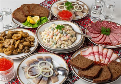Traditional Lithuanian festive table with herring