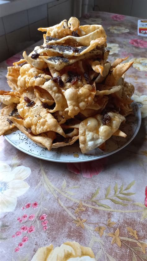 Lietuviškas skruzdėlynas su aguonomis